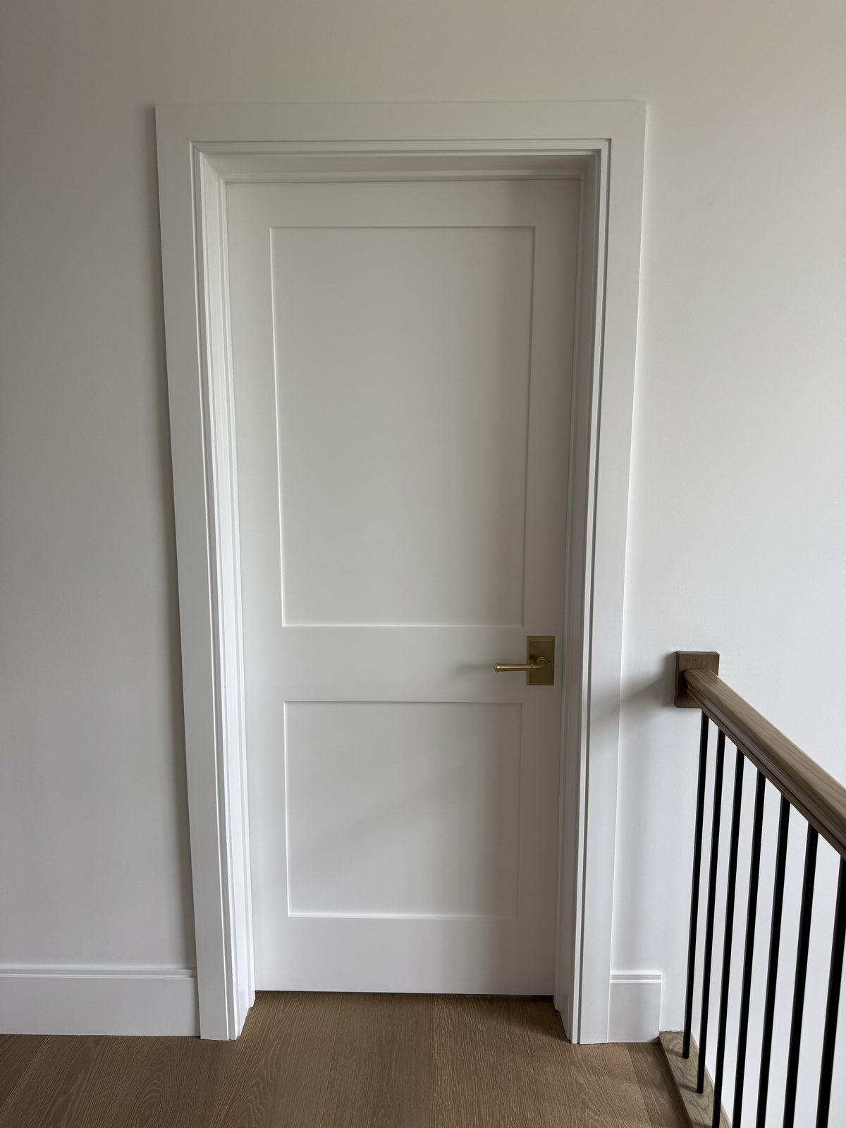 Custom interior door with trim carpentry